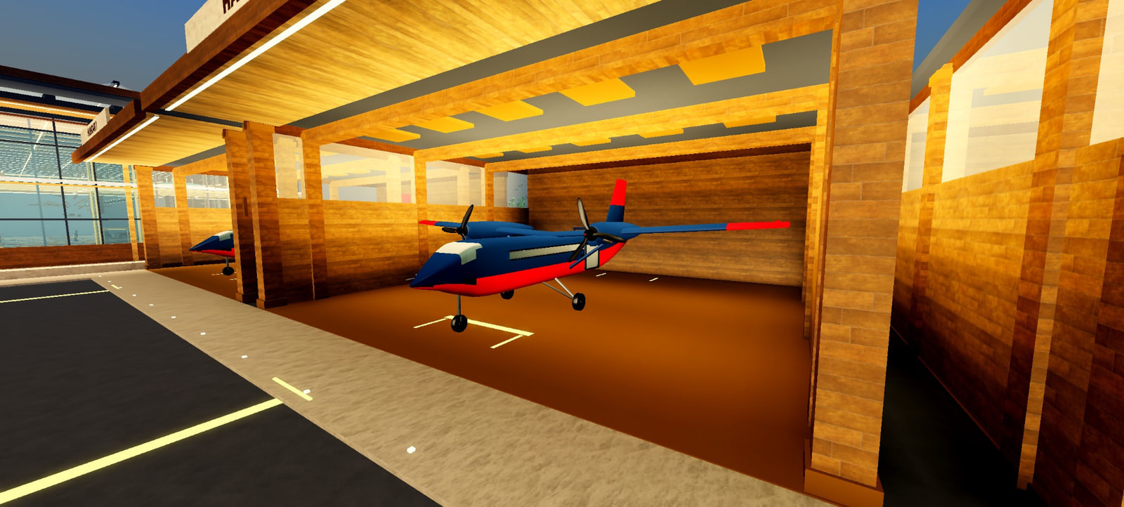 The Twin Otter waiting in an open hangar